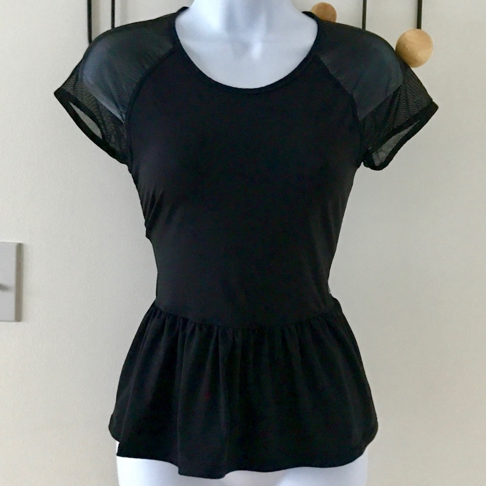 Adorable mesh and peplum workout top